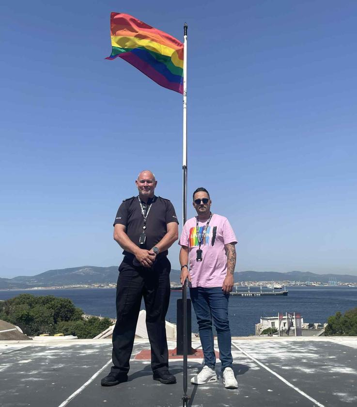 Police Constable Jason Russell and Raygan Martinez-Gaivizo at the flag raidsing ceremony.